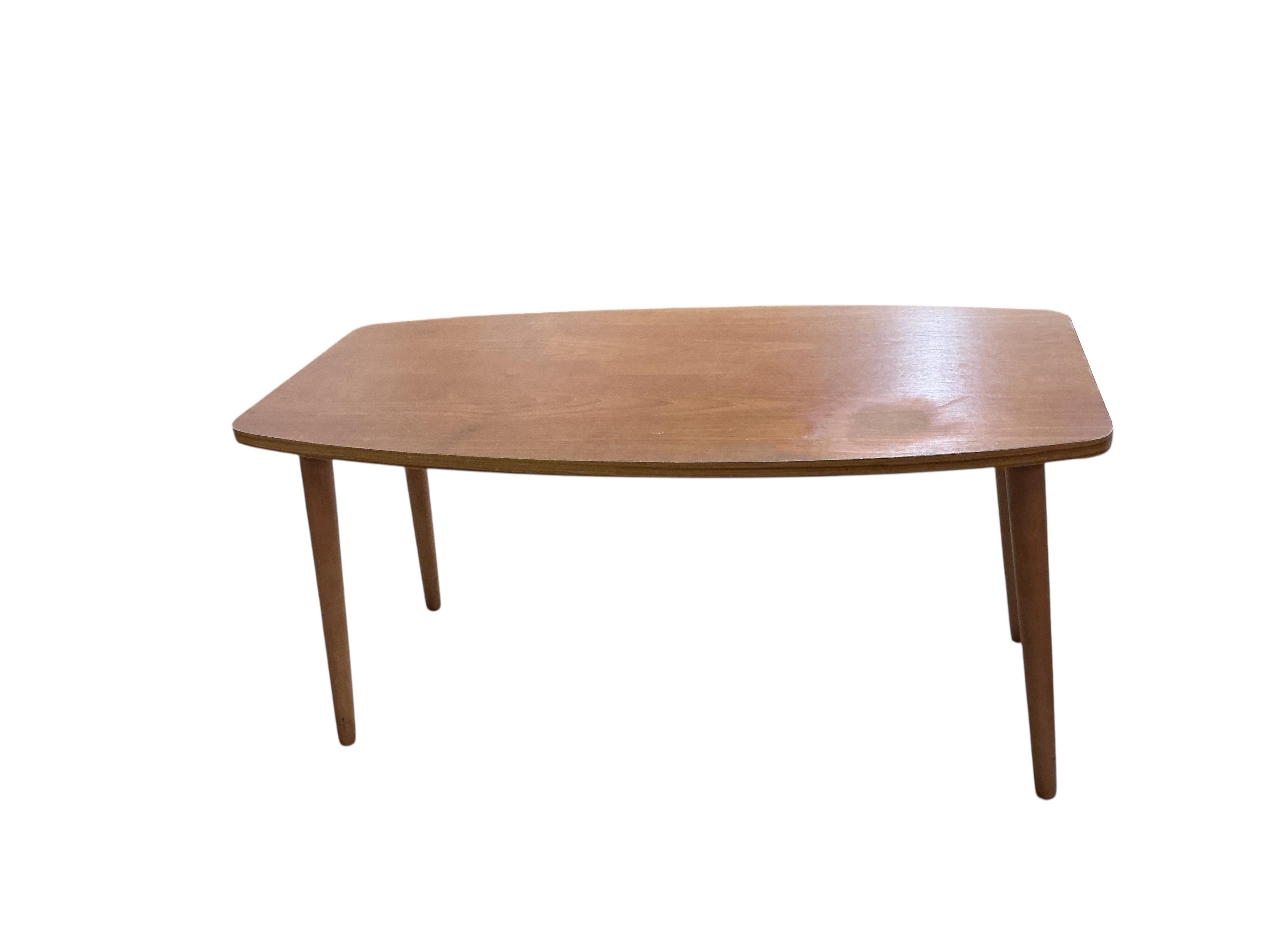 A nest of three mid century Nathan teak tea tables, width 52cm, depth 48cm, height 50cm together with a mid century teak coffee table